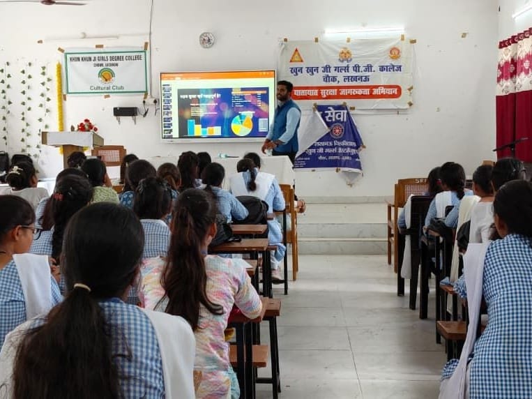 A facilitator presenting charts on a screen to rows of students at Khun Khun Ji Girls Degree College, Lucknow